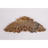 A Chinese carved and pieced hardstone pendant/scroll weight with stylised dragon decoration, 2" x 5"