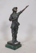 A bronze figure of a Chinese woman Communist party member, bearing the Red Book and saluting,