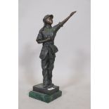 A bronze figure of a Chinese woman Communist party member, bearing the Red Book and saluting,