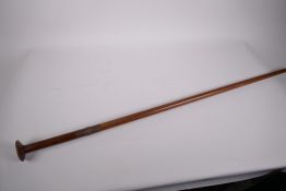 A Anglo Indian hardwood and steel swordstick with copper ferule marked 'Made in Hittadu' (a small