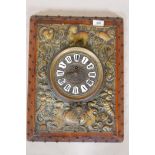 A C19th Continental wall clock, with repousse brass front, decorated with beasts and birds, and