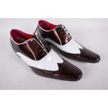 A pair of men's dress shoes by Guiciani, size 9