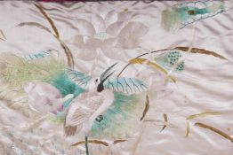 A Japanese silk embroidery depicting cranes and lotus flowers, 26" x 16"