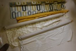 Four remnant bolts of fabric, various designs