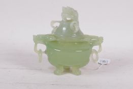 A celadon colour hardstone koro and cover, with ring handles and dragon mask decoration, 5" high