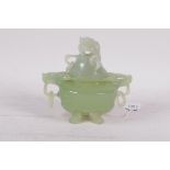 A celadon colour hardstone koro and cover, with ring handles and dragon mask decoration, 5" high