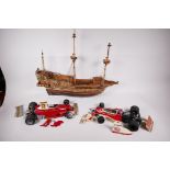 Two detailed plastic models of mid 1970s F1 racing cars, Ferrari 312 and McLaren M23, 14" long, both