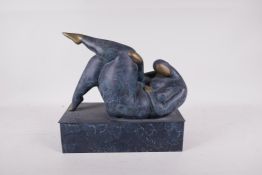 A modernist bronze figure of a plump female nude, 10" x 5"