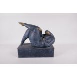 A modernist bronze figure of a plump female nude, 10" x 5"