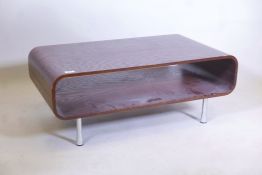A stained elm occasional table, raised on chrome supports, 35" x 20" x 14"