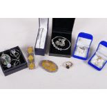 A quantity of silver jewellery including a topaz set bangle etc