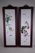 A pair of Chinese polychrome porcelain panels decorated with insects, fruit, gourds and flowers,