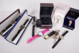 A collection of watches to include Casio, Rocaware, Lambretta, French Connection etc