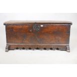 A late C18th/early C19th French planked coffer, constructed of various timber, walnut, chestnut
