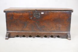 A late C18th/early C19th French planked coffer, constructed of various timber, walnut, chestnut