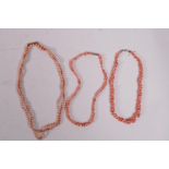 Three vintage coral bead necklaces, longest 38"