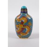 A Chinese cloisonne snuff bottle with dragon decoration, 4 character mark to base, 3¼" high