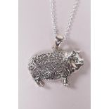 A sterling silver pig pendant necklace, 1" drop