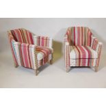 A pair of Oka small George club chairs
