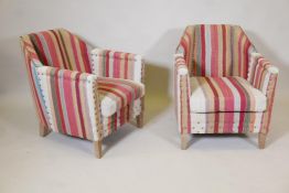 A pair of Oka small George club chairs