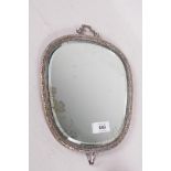 Oriental silver plated mirror, inset with bevelled glass, the back engraved with cranes under