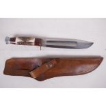 A Bowie knife by J. Nowill & Sons, Sheffield, with 8" blade and antler handle in a fitted leather