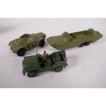 Three Dinky Toys model army vehicles, a DUKW Amphibian, 5" long, a Ferret Scout car and an Austin