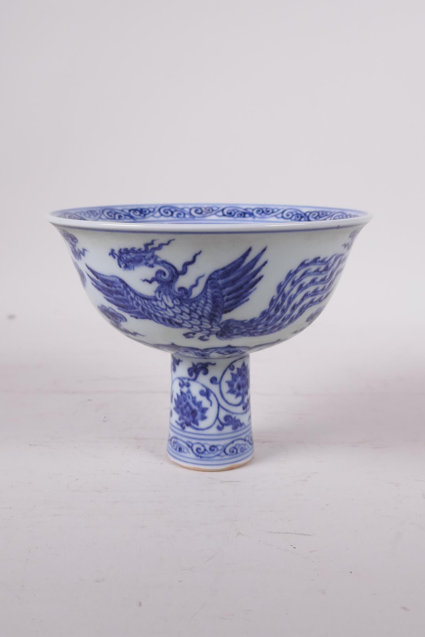 A Ming style blue and white porcelain stem bowl with phoenix decoration, Chinese, 4" high x 5" - Image 3 of 5