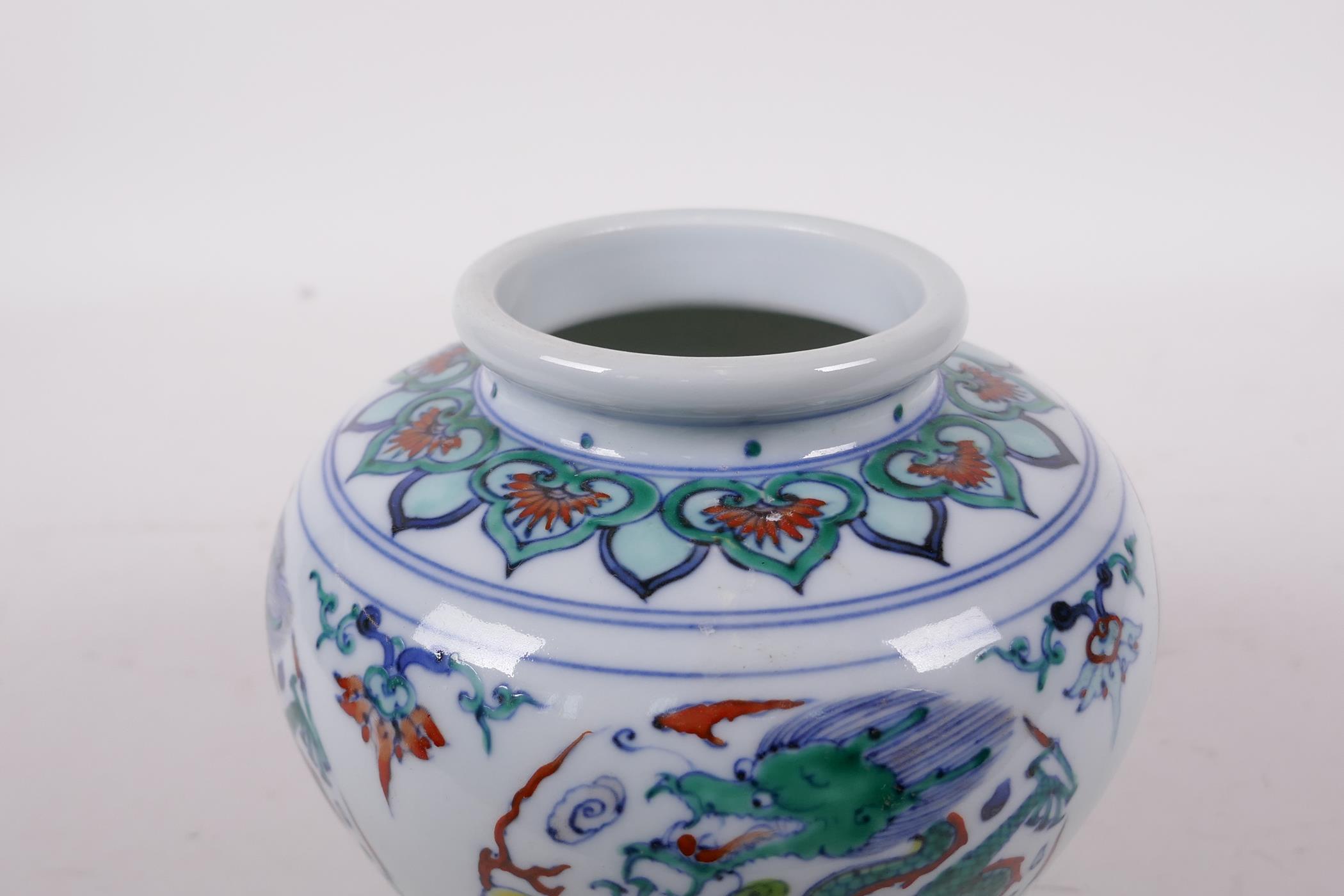 A Doucai porcelain jar decorated with five toed dragons chasing the flaming pearl, six character - Image 5 of 5