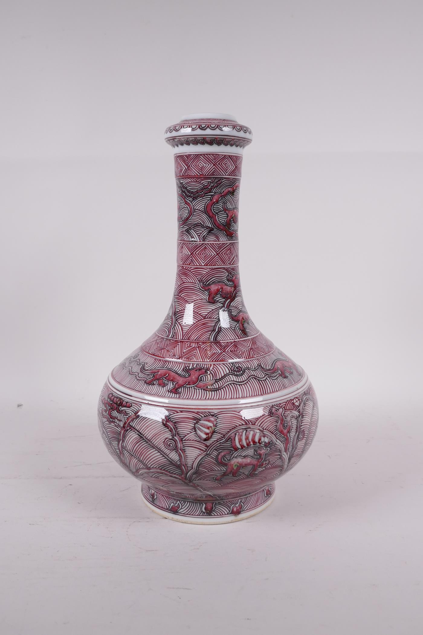 A Chinese red and white bottle vase decorated with mythical creatures, six character mark to base, - Image 4 of 5