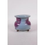 A Jun ware pottery censer raised on tripod supports, 3" high x 4" diameter