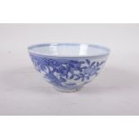 A Chinese blue and white porcelain rice bowl decorated with deer and peach trees, six character mark