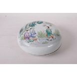 An early c20th famille vert porcelain box and cover decorated with fishermen, four character mark to