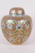 A Chinese cloisonne ginger jar and cover decorated with flowers and scrolls on a gilt ground, 8"