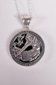 A sterling silver Sagittarius pendant necklace, 1½" drop