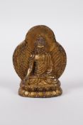 A Sino-Tibetan gilt bronze of Buddha seated on a lotus throne, 2½" high