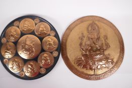 A copper wall plaque depicting Ganesh with bejewelled necklace and headdress, 12" diameter, together