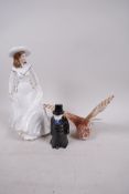 A Royal Worcester porcelain figurine 'Birthday Wish', together with a candle snuffer 'The Artful