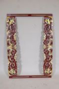 A Chinese carved and painted wood frame with gilt bat decoration, 16" x 36" aperture