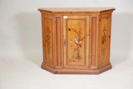 A pine side cabinet with canted corners and painted decoration to the fielded panels, 36" x 12", 30"