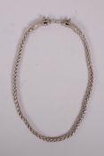 A white metal chain link necklace with dragon head clasps, Chinese, 26" long