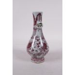 A Ming style red and white pottery vase with climbing kylin decoration to neck, 6" high