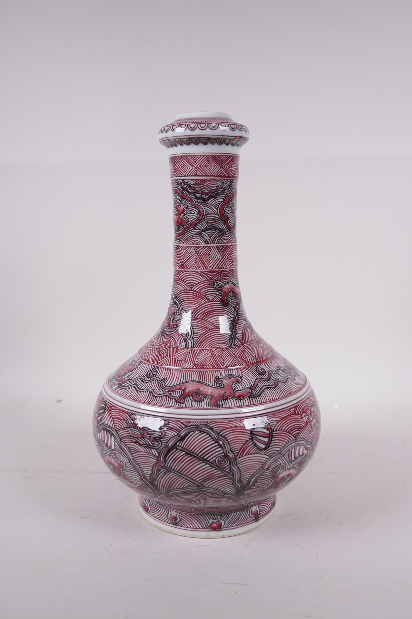 A Chinese red and white bottle vase decorated with mythical creatures, six character mark to base, - Image 2 of 5