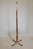 A bespoke copper floor lamp, 53" high