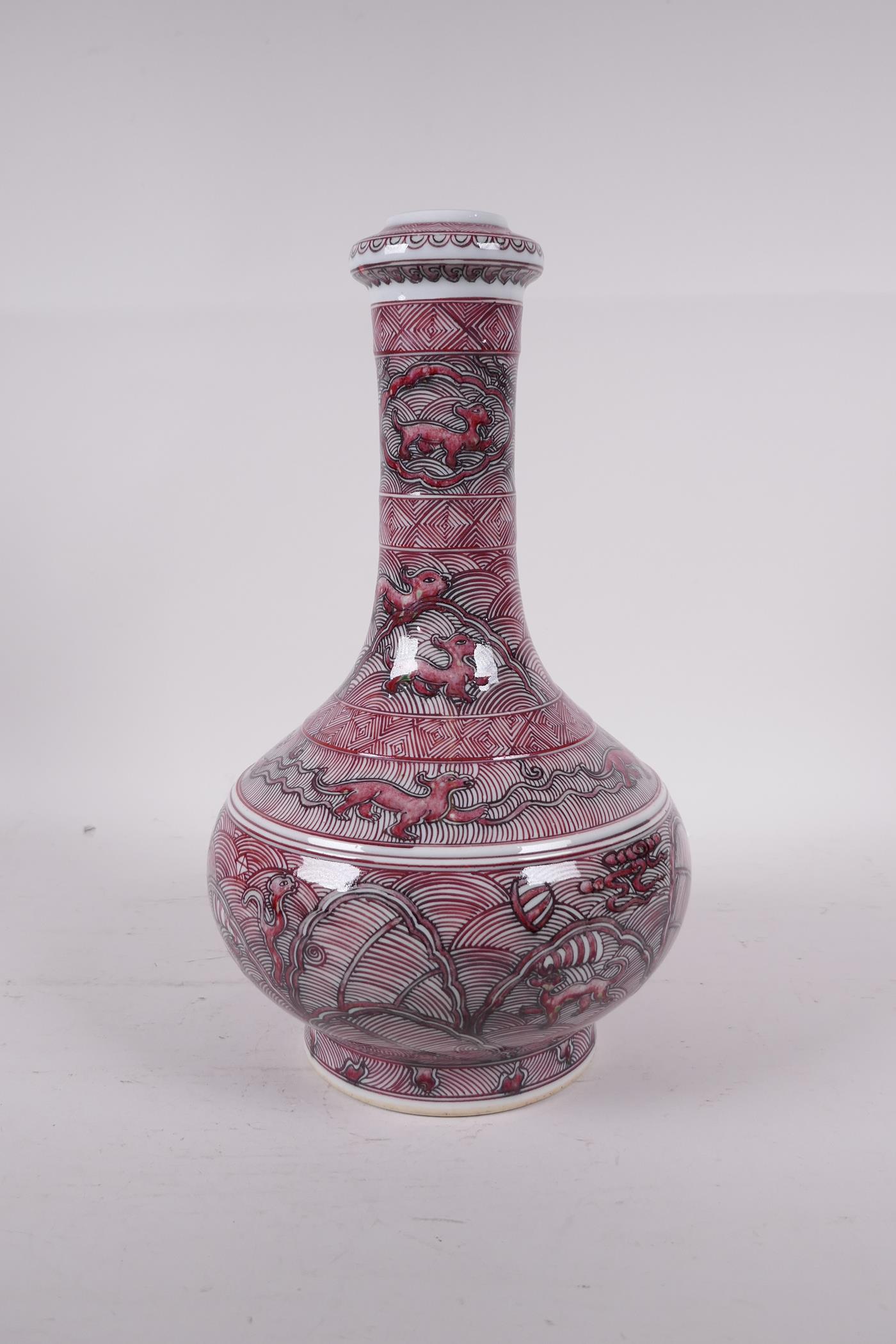 A Chinese red and white bottle vase decorated with mythical creatures, six character mark to base, - Image 3 of 5