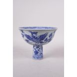 A Ming style blue and white porcelain stem bowl with phoenix decoration, Chinese, 4" high x 5"