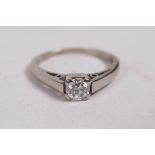 An 18ct white gold diamond solitaire ring, approx 0.2ct, 2.5g, size J