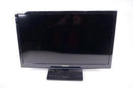 A Samsung 24" flat screen television (used as a monitor)