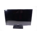 A Samsung 24" flat screen television (used as a monitor)