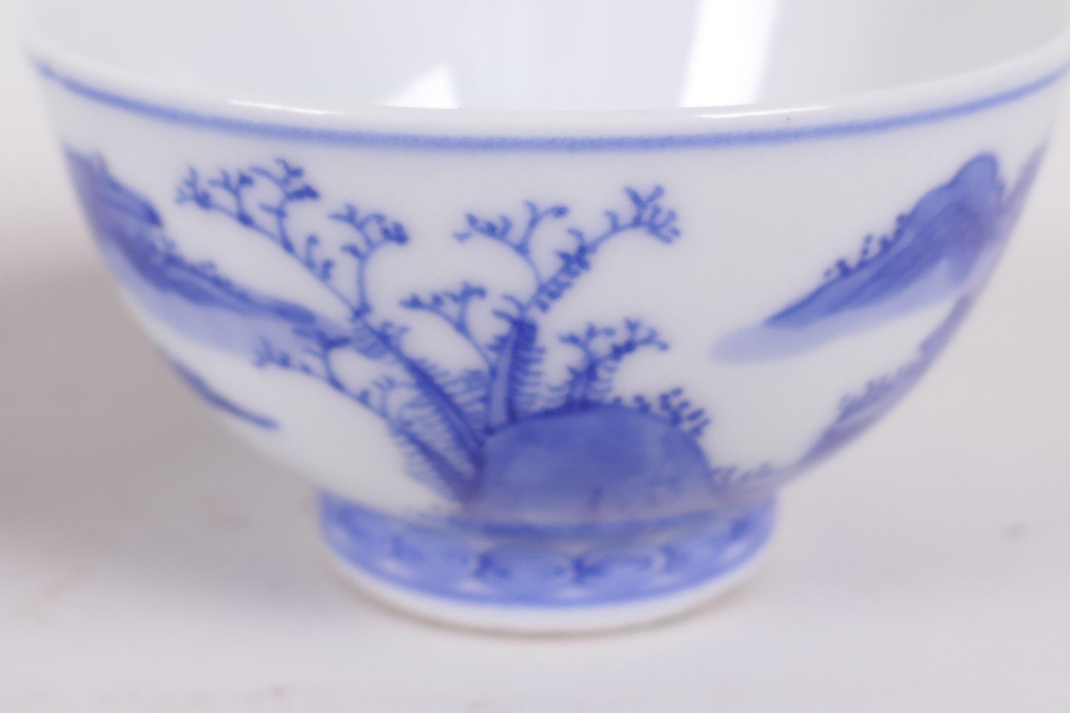 A Chinese blue and white porcelain tea bowl decorated with a figure in a continuous landscape, 6 - Image 3 of 6